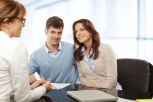 Contemporary young couple get financial advise.